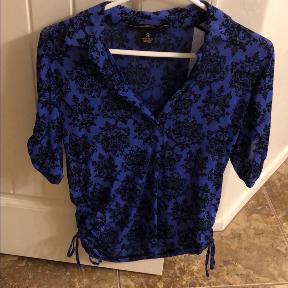 Very nice blue and black blouse.